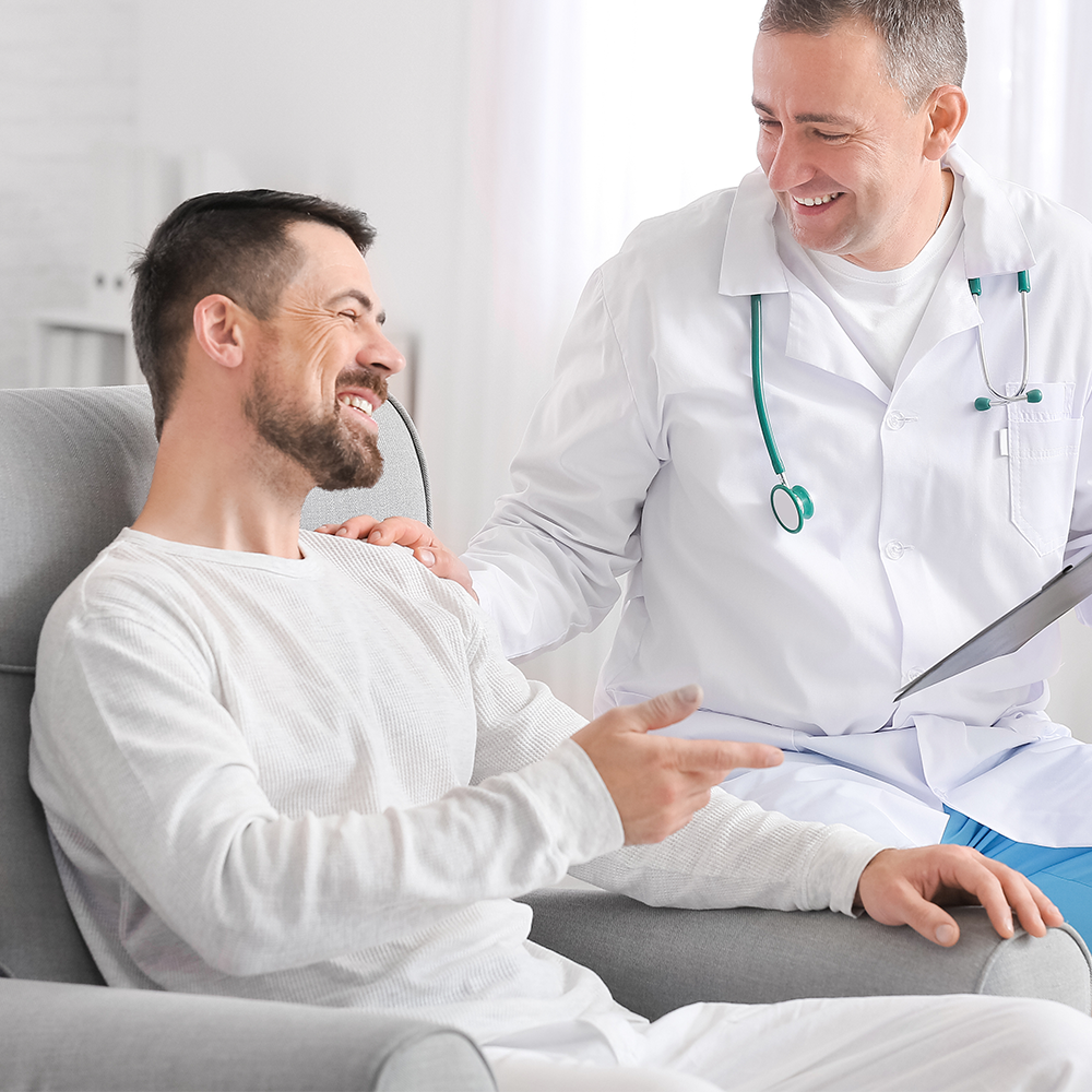 A man speaking to a doctor